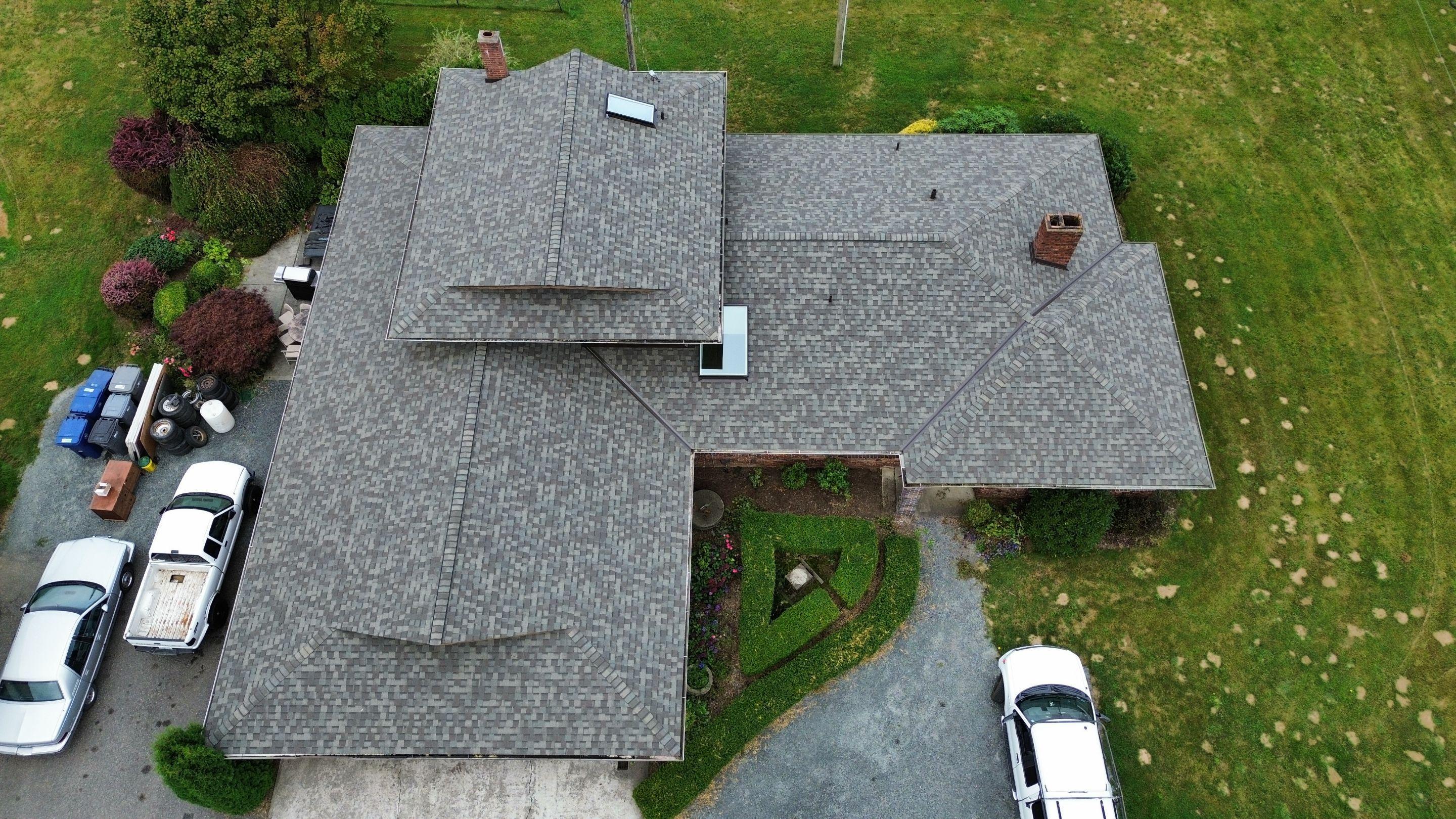 Best Exterior Cleaning providing free roof cleaning estimate to homeowner in Redmond Washington