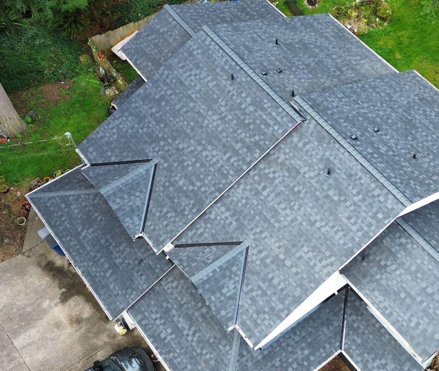 Bundled exterior cleaning services including roof cleaning gutter cleaning and pressure washing in Snohomish County Washington